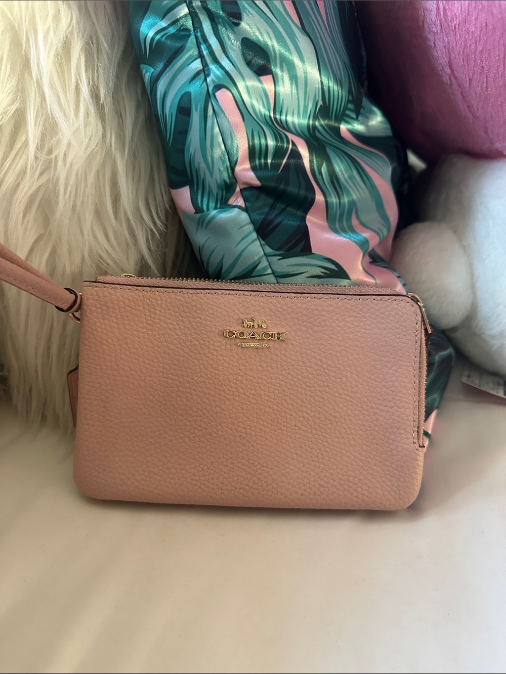 Coach light pink wristlet